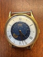 VINTAGE TIMEX M CELL ELEGANTE QUADRANTE FASI LUNARI QUARZO UOMO ORO FUNZIONA NEWBATTER