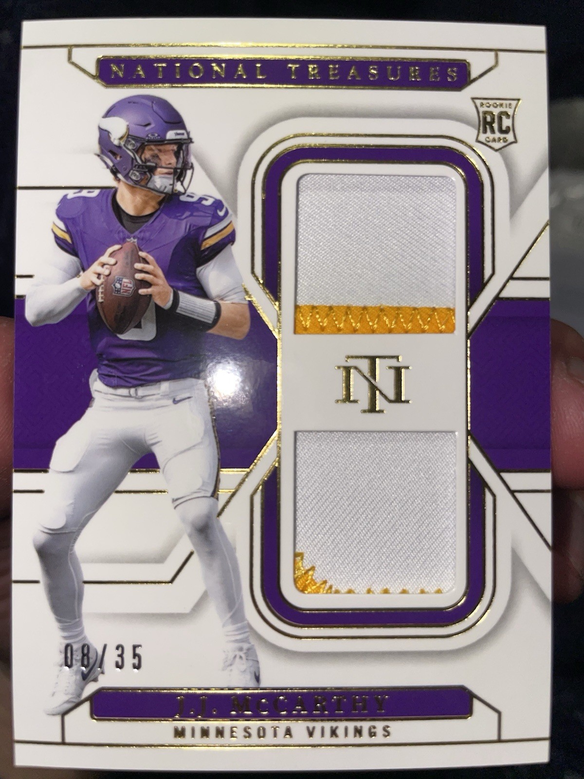 J.J. MCCARTHY 2024 NATIONAL TREASURES ROOKIE DUAL PATCH GOLD RC /35