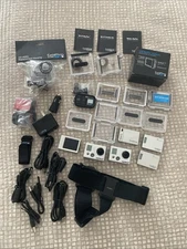 Assorted GoPro Hero & Hero2 Camera's, Screen, Batteries, Cases & More - AS IS