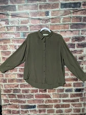Polo Bonetta Women's. Dk Green. Size Length 30" Shoulders 20" Chest 24" Sleeves