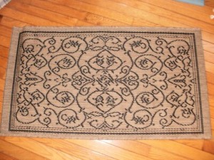 Couristan area rug suitable for indoor/outdoor use 42"x23" NEW never used.