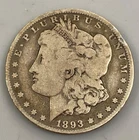 1893 P US 90% Silver Morgan $1 damaged rim bent key date L24856