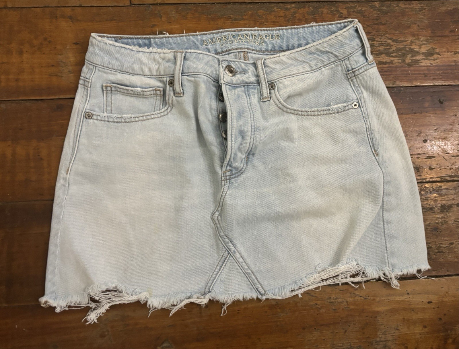 American Eagle Denim Mini Skirt Womens 8 Light Wash Button Fly Raw Hem