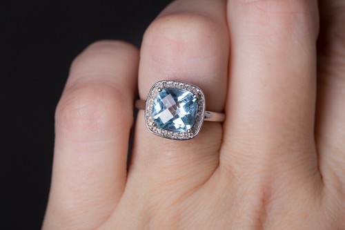 4 Carat Sky Blue Topaz and .15 Carat Diamond Halo 14k White Gold Ring Cocktail