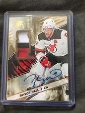 2018-19 UD SPX#11 TAYLOR HALL 3 COLOR PATCH AUTO 7/49