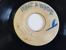 (Ska) 45"  THEOPHILUS BECKFORD - what a whoe/Bajan Girl  on   Blank  Label  1965