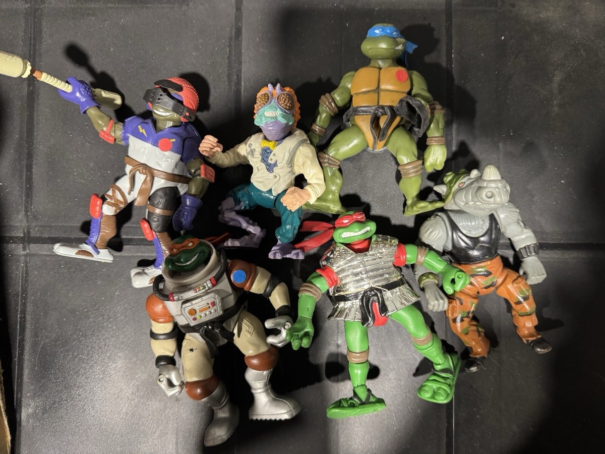 Teenage Mutant Ninja Turtles: A collection of twelve carded Playmates, Teenage Mutant Ninja Turtles (TMNT) figures