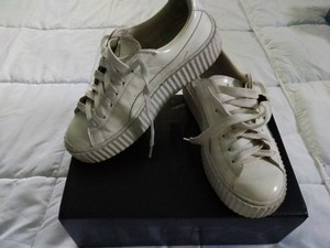 puma white patent sneakers