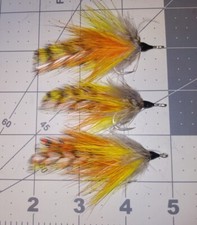 3 Each 1/0 Orange And Yellow Grizzly tarpon fly.  keys style on Gamakatsu SL12S