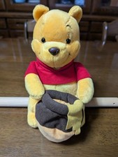 Peluche Winnie the Pooh con vaso di miele NTT