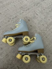blue roller skates with yellow wheels and laces size 5 women  s Worn inside only