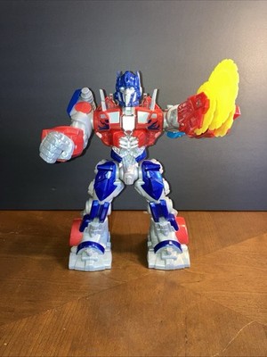 Transformers Optimus Prime Electronic Robot with Spinning Saw Arm Lights Sounds