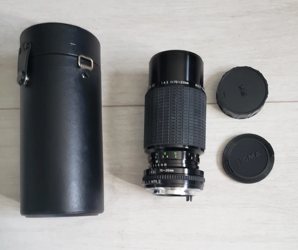 Objectif Sigma Zoom KII - 1 : 4,5 F =70 - 210 mm + Bouchons vendu avec Etui - Photo 1/4