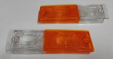 Coppia dx+sx plastiche fanali anteriori Fiat Ritmo 1° serie