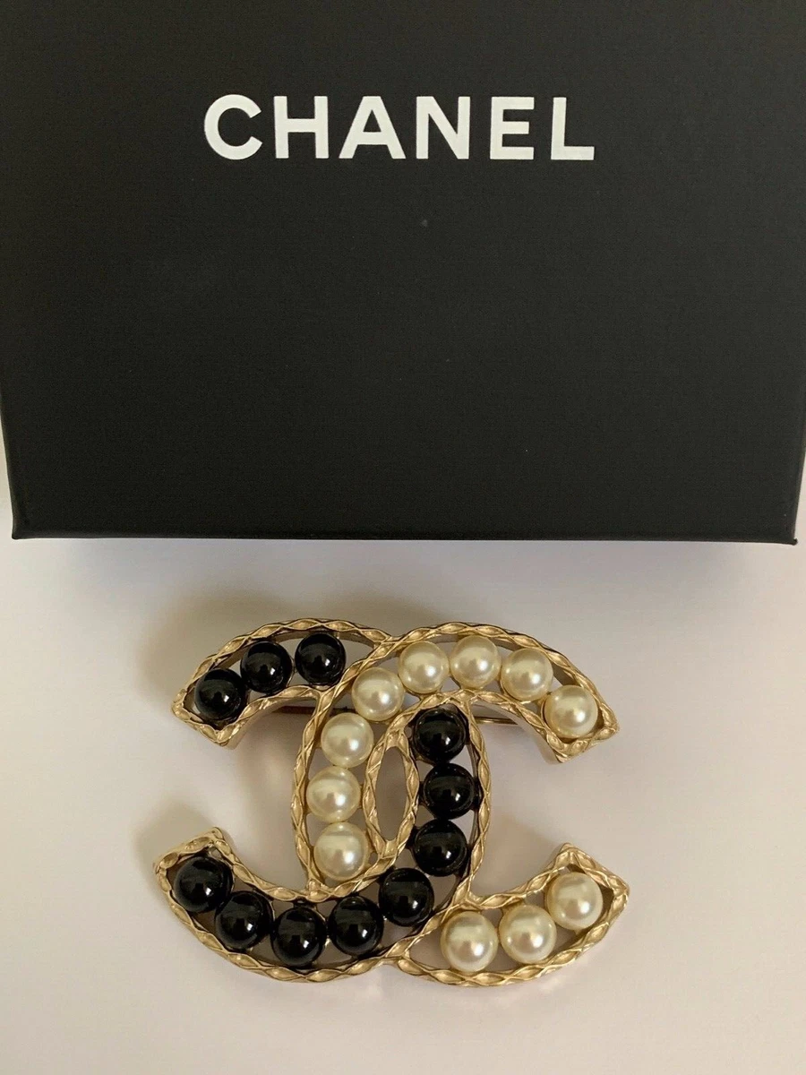 Coco Chanel Pin Brooch in Gilt Metal CC Logo Pearl and Strass at 1stDibs