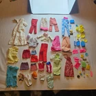 Lot Of Vintage Barbie Clothes And Accessories