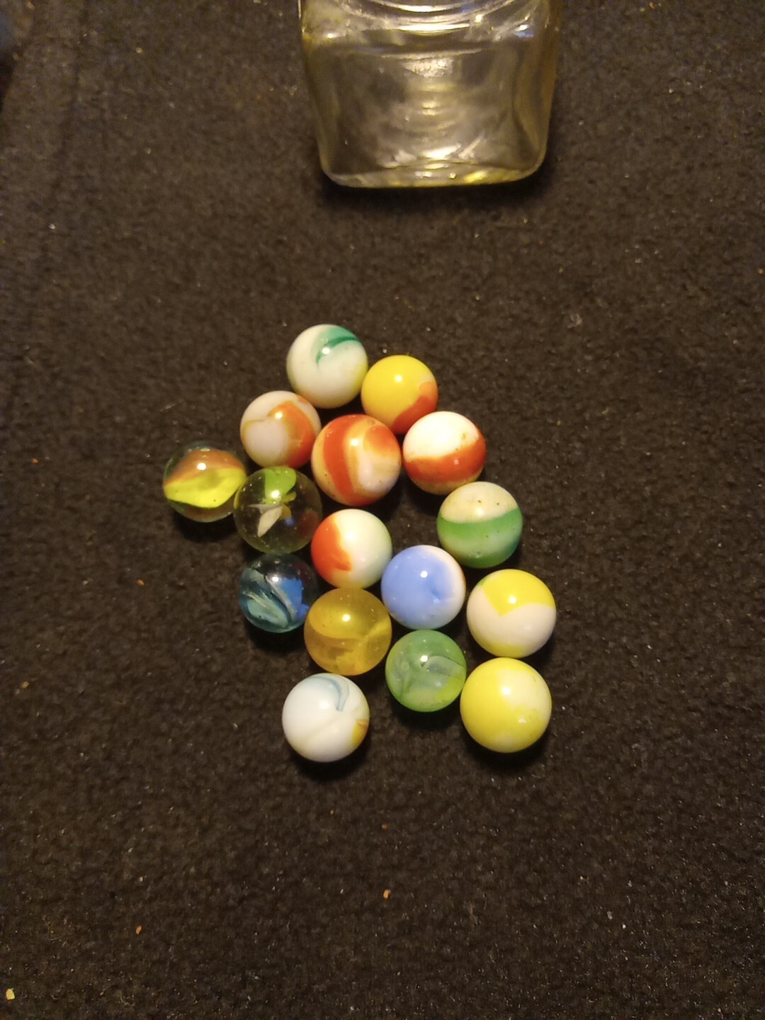 Marbles in a well 16 marbles in an ink well. YARD SALE FIND. SEE PHOTOS