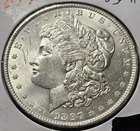 A 1897 BU MORGAN SILVER DOLLAR UNC MS+++