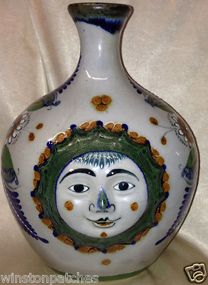 ERANDI TONALA MEXICO 9'' VASE SMILING FACE SUN ON TWO SIDES FLOWERS BLUE LEAVES