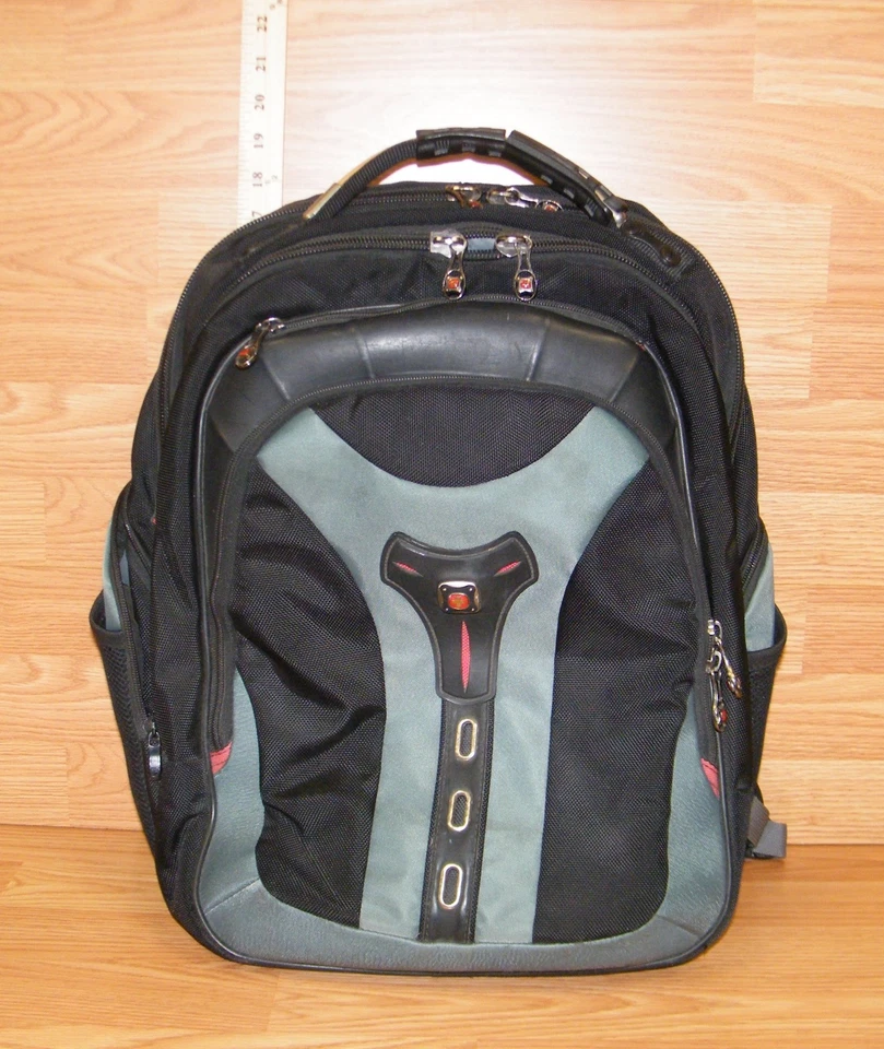 Mochila Swiss Gear genuina verde y negra con correas amortiguadoras **LEER**  Foto 3 de 4