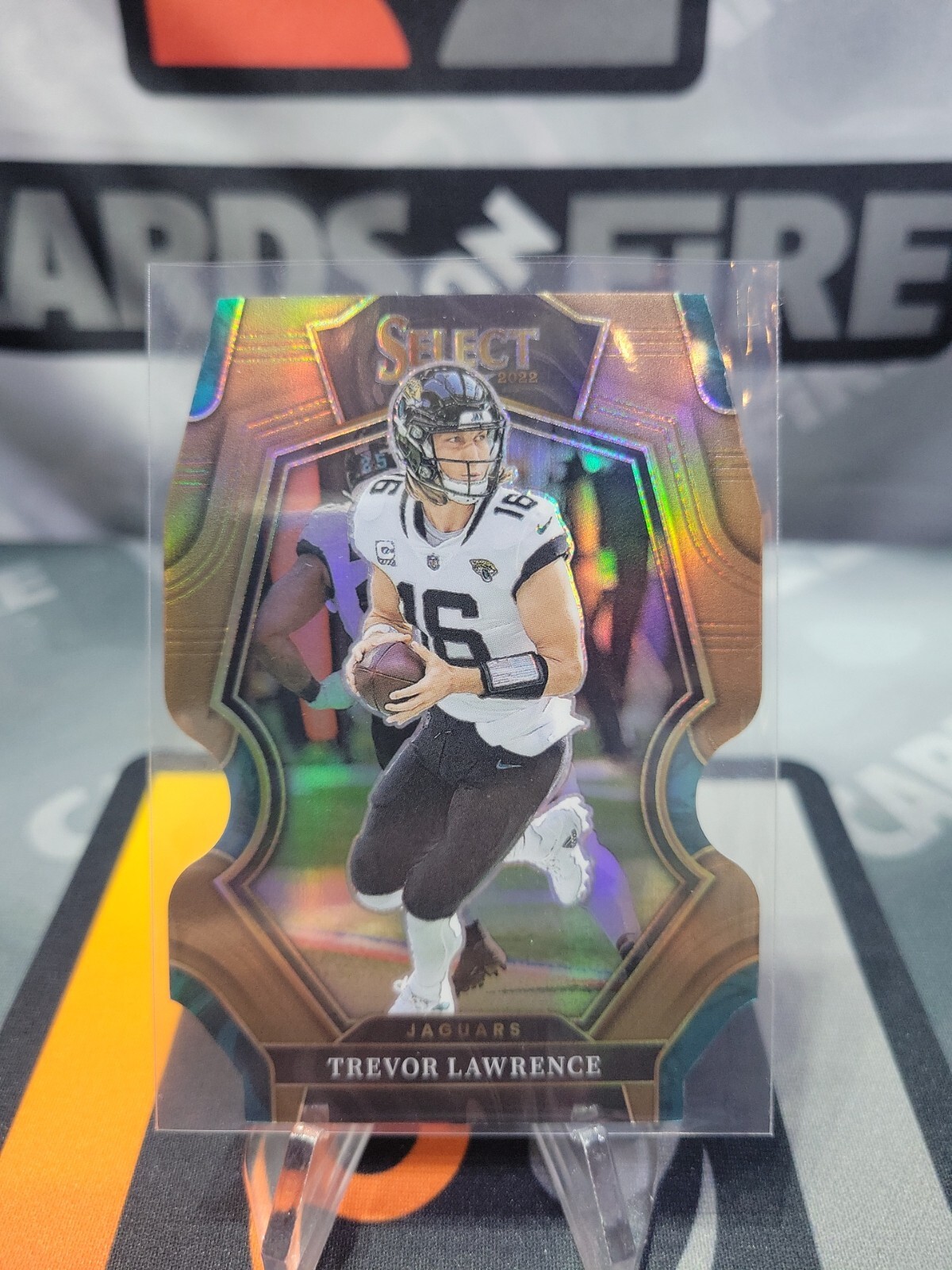 TREVOR LAWRENCE SP 2022 SELECT #145 PREMIER LEVEL DIE-CUT COPPER PRIZM /99