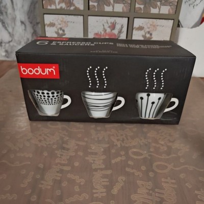 Bodum Paula 6er Set Espresso Kaffeetassen & Untertassen - schwarz & weiß verpackt