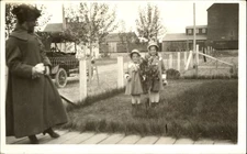 RPPC young girl Easter? Dresses bonnets ~ 1920s auto ~ railroad cars ~ 1904-1918