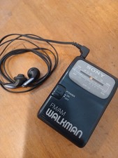 Vtg Sony Walkman SRF-39 AM/FM Portable Handheld Radio Stereo Belt Clip Ear Buds