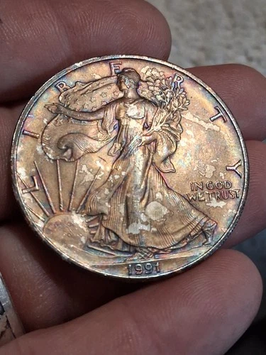 1991 American Silver Eagle 1 Troy oz .999 Toned In BU