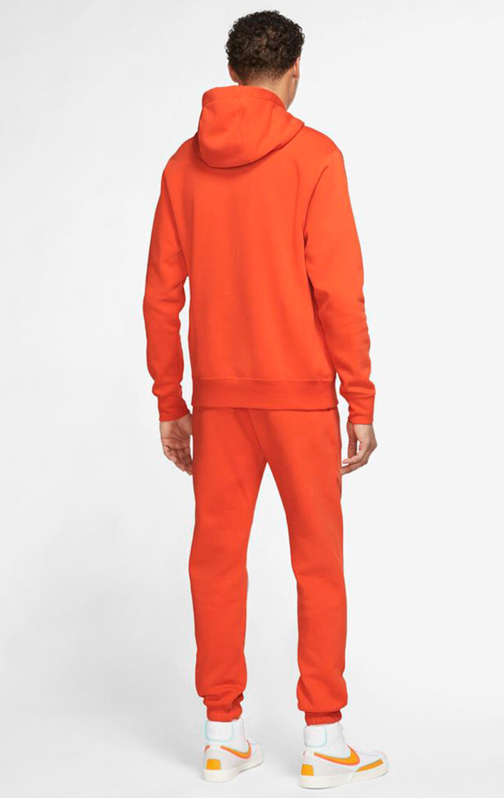 orange tracksuit nike