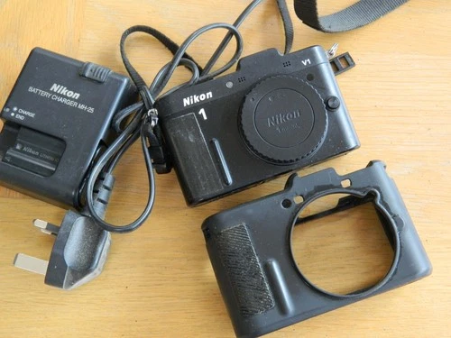 Nikon 1 V1 digital camera black body + rubber armour etc.