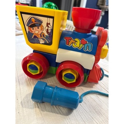 Vintage Take Apart Pull Along Toy Train with Wrench Tool Colors Conductor