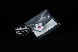 supreme flower pin