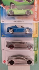HOT WHEELS TESLA MODEL S AND TESLA ROADSTER SET OF FOUR VARIATIONS