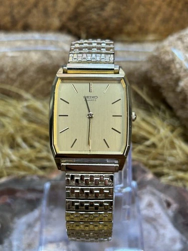 Vintage Men’s Gold Tone Japan Seiko Slim Tank Style Quartz Watch.  Runs Great