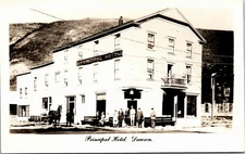 RPPC Real Photo Postcard YT Dawson Principal Hotel Buggy Men in Suits ~1910 K28