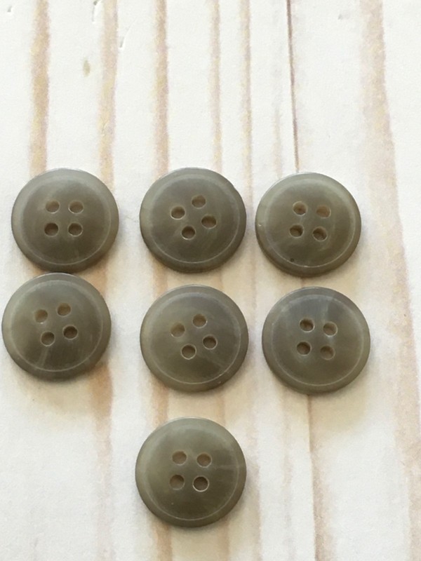 natural two tone color 4 hole buttons- slight curve center/ flat back- 5/8”