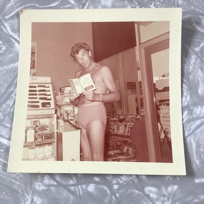 Vintage 1955 Kodacolor Photo Shirtless Man Reading in Drugstore Pharmacy 3.5x3.5