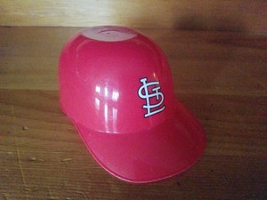 small plastic baseball hats