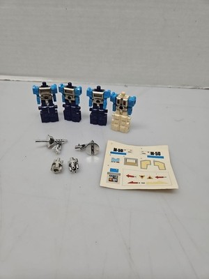 4 Takara Robotech Blockman Robolinks  White And Blue Plus some parts.