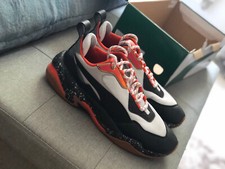Puma Thunder Spectra Scarpe da ginnastica arancione nero e oro 