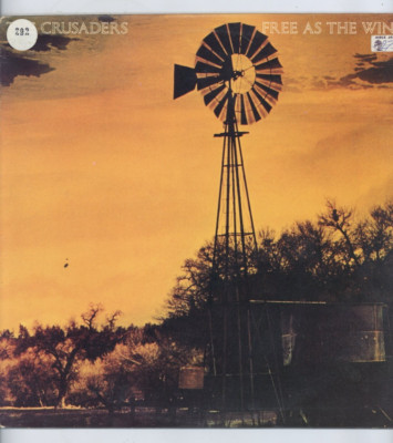 '' FREE AS THE WIND.'' the crusaders. ABC RECORDS UK orig L.P. 1977.