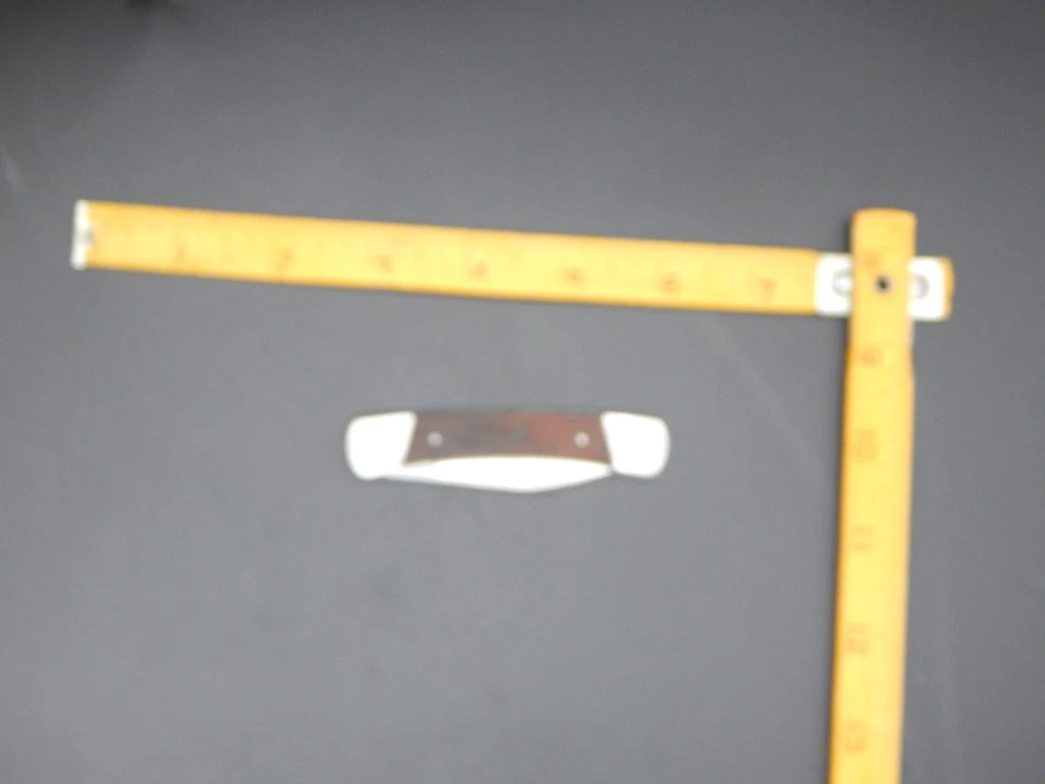 Navaja de bolsillo plegable vintage Buck 703 U.S.A mango de madera marrón Foto 4 de 4