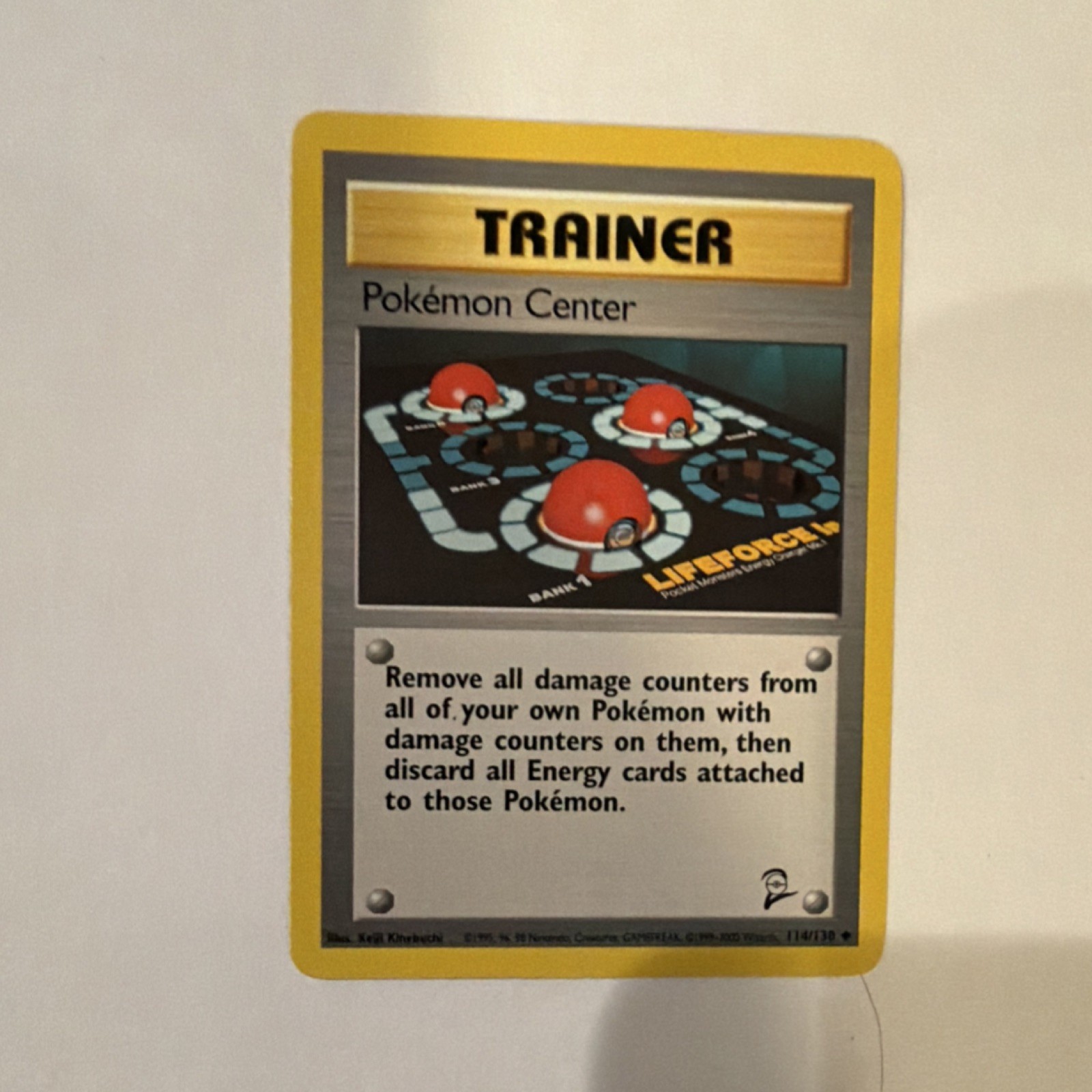 Pokémon Center 114/130 Base Set 2 Trainer Uncommon Regular English