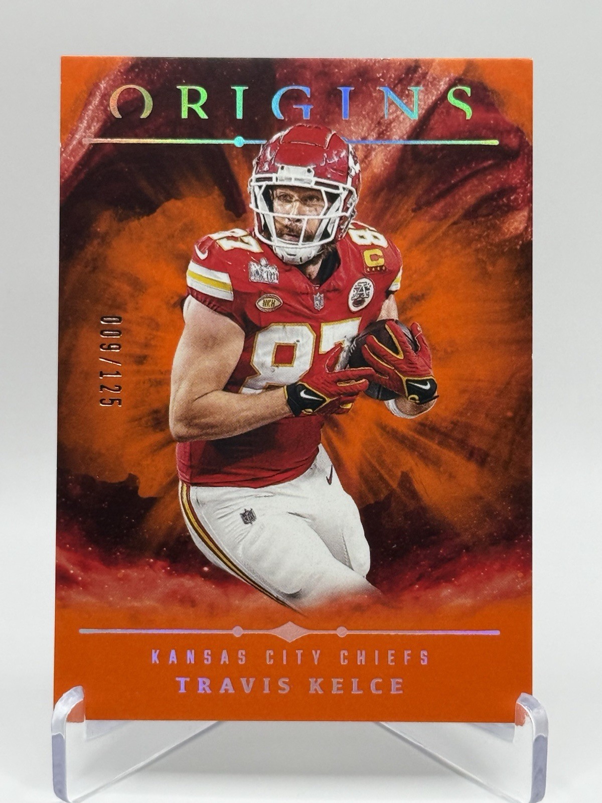 2024 Panini Origins - Travis Kelce #28 Orange /125