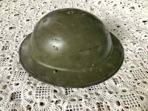 British Empire WWI helmet (Brodie) with straps and liner, found in Flanders
