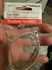 Radio Shack 1 ft line cord connects modular base to telephone wiring terminal