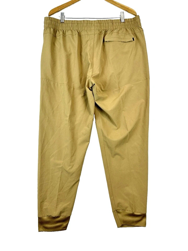 Pantalones elásticos de entrenamiento BCG Academy con bolsillos color caqui tostado para hombre XL Foto 2 de 4