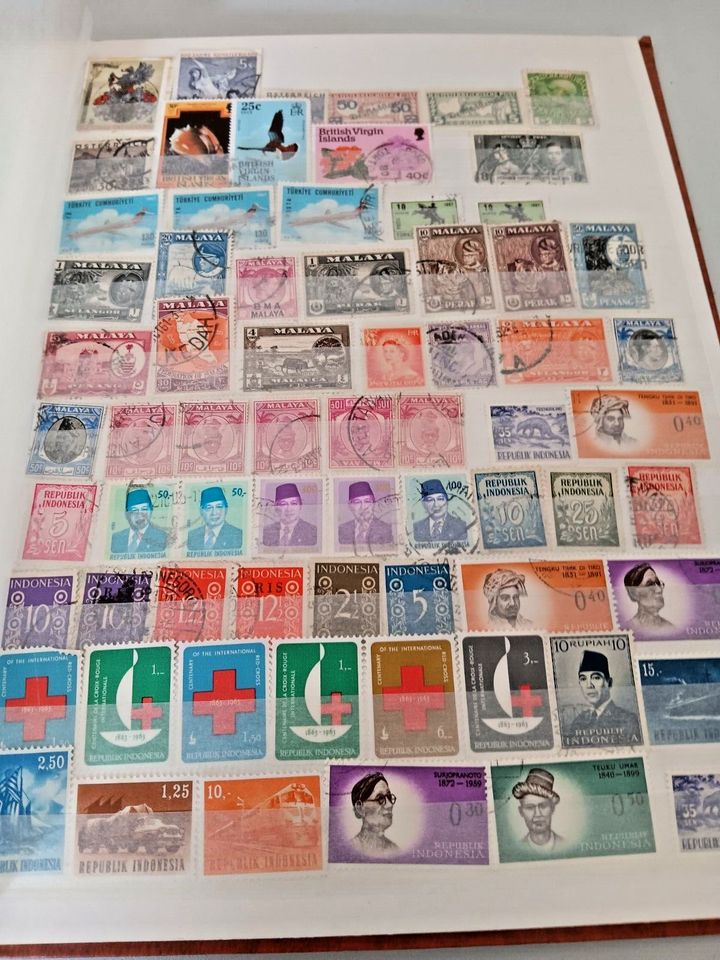 stamp stock book used with 2165 world stamps on 16 pages see all photos