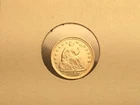 1857 Seated Liberty Half Dime in almost uncirculated